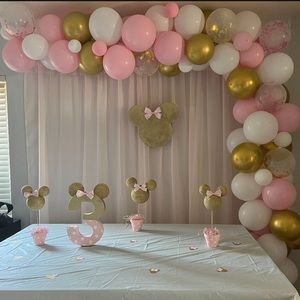 Minnie Mouse inspired pink and gold birthday decorations
